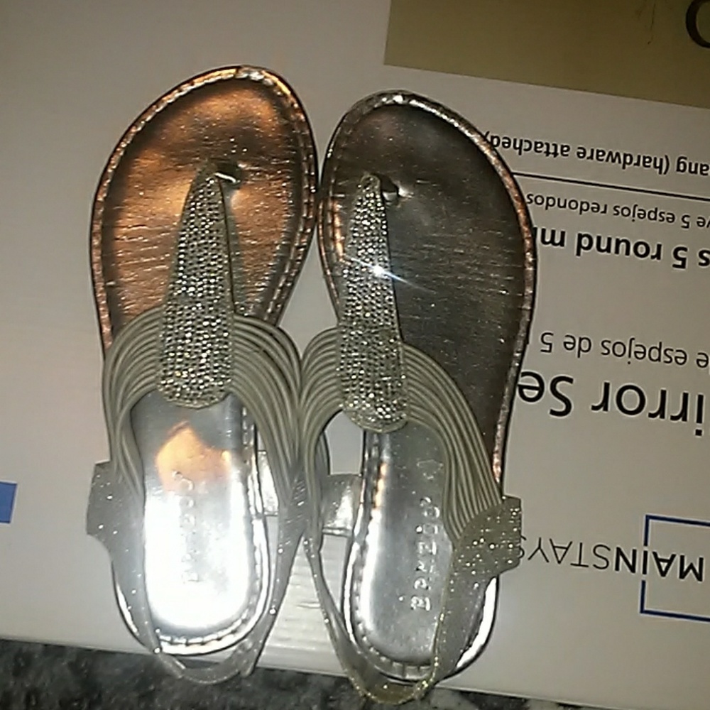 Strappy metallic silver sandals
